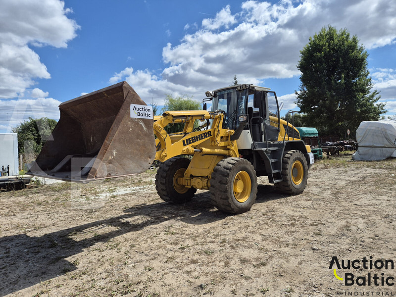 Liebherr L 524 - Chargeuse sur pneus: photos 1 Liebherr L 524 - Chargeuse sur pneus: photos 1