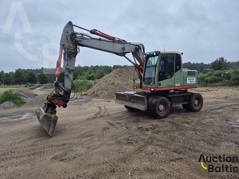 Volvo EW 140 C - Pelle sur pneus: photos 1 Volvo EW 140 C - Pelle sur pneus: photos 1