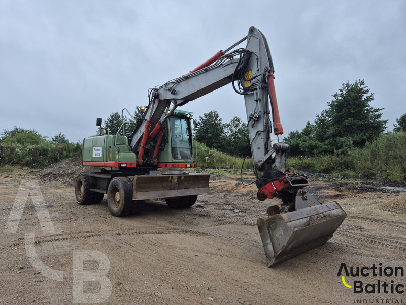 Volvo EW 140 C - Pelle sur pneus: photos 2 Volvo EW 140 C - Pelle sur pneus: photos 2