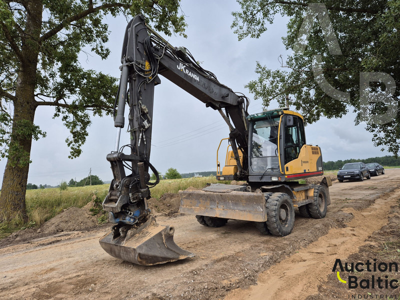 Volvo EW 140 C - Pelle sur pneus: photos 1 Volvo EW 140 C - Pelle sur pneus: photos 1
