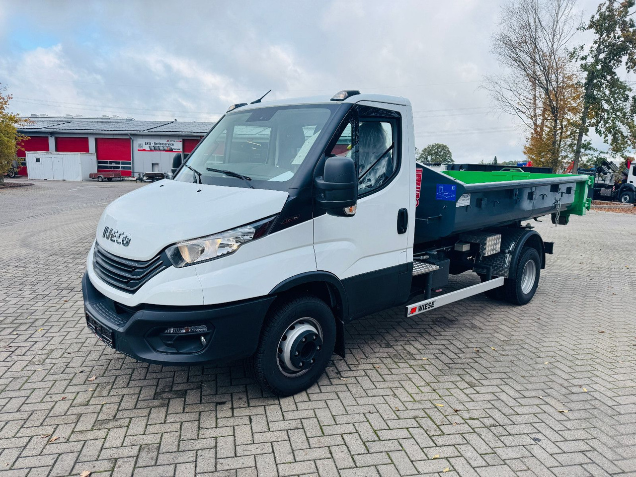 Iveco Daily 70C18H Hyva Abrollkipper - Camion ampliroll: photos 1 Iveco Daily 70C18H Hyva Abrollkipper - Camion ampliroll: photos 1