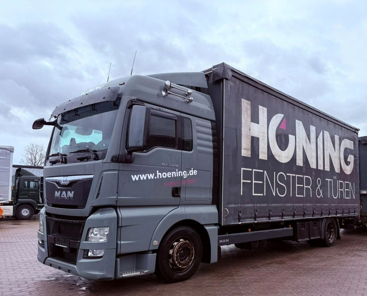 MAN TGX 18.440 LL Volumen LKW mit Staplerhalterung MAN TGX 18.440 LL Volumen LKW mit Staplerhalterung - Camion à rideaux coulissants: photos 1 MAN TGX 18.440 LL Volumen LKW mit Staplerhalterung MAN TGX 18.440 LL Volumen LKW mit Staplerhalterung - Camion à rideaux coulissants: photos 1