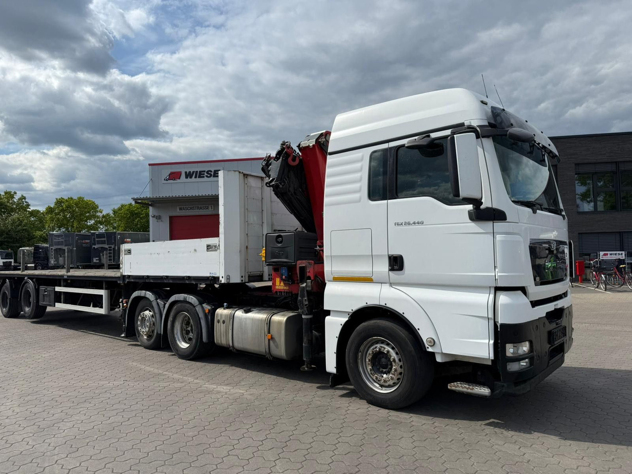 MAN TGX 26.440 6x2 mit HMF 3000-5 Kran - Camion grue: photos 1 MAN TGX 26.440 6x2 mit HMF 3000-5 Kran - Camion grue: photos 1