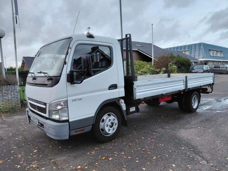 Mitsubishi Canter 7C15 4x2 STEEL SPRING MANUAL GEARBOX - Camion plateau: photos 1 Mitsubishi Canter 7C15 4x2 STEEL SPRING MANUAL GEARBOX - Camion plateau: photos 1