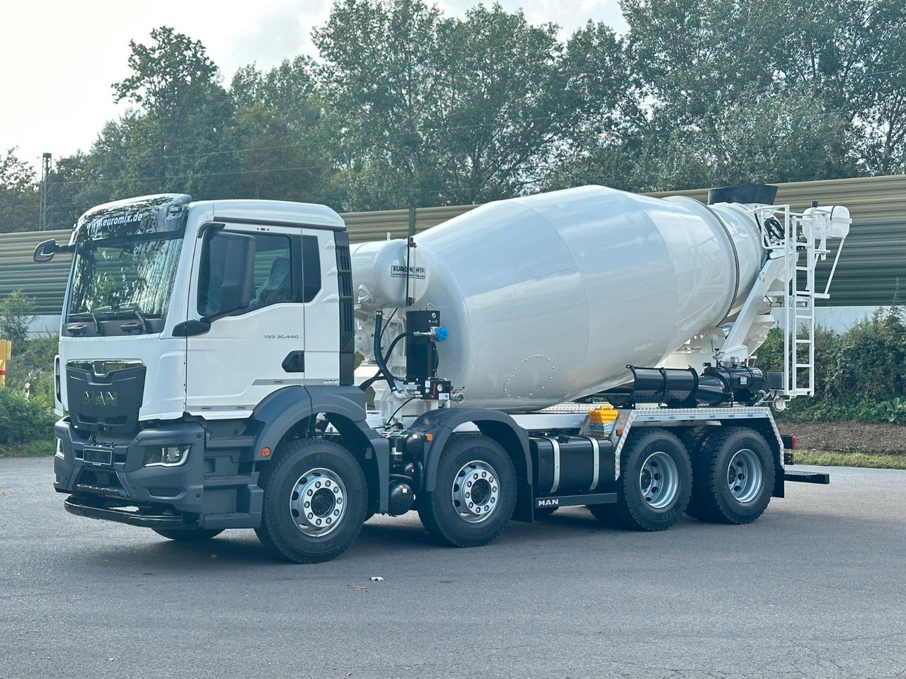 MAN TGS 32.440 8x4 / Euromix MTP EM 9 L - Camion malaxeur: photos 1 MAN TGS 32.440 8x4 / Euromix MTP EM 9 L - Camion malaxeur: photos 1