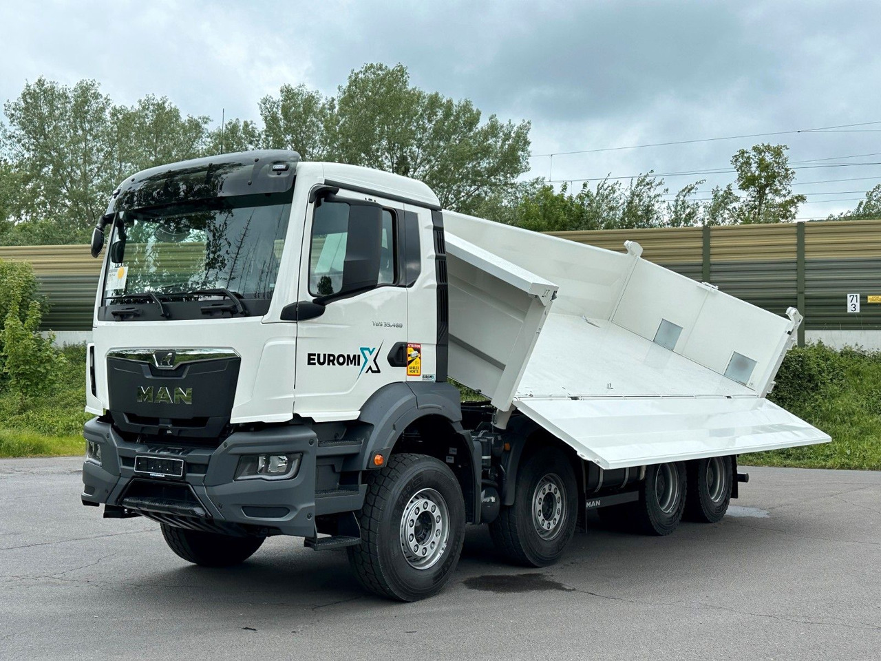 MAN TGS 35.480 8x4 EuromixMTP 2-Seiten-Kipper - Camion benne: photos 1 MAN TGS 35.480 8x4 EuromixMTP 2-Seiten-Kipper - Camion benne: photos 1