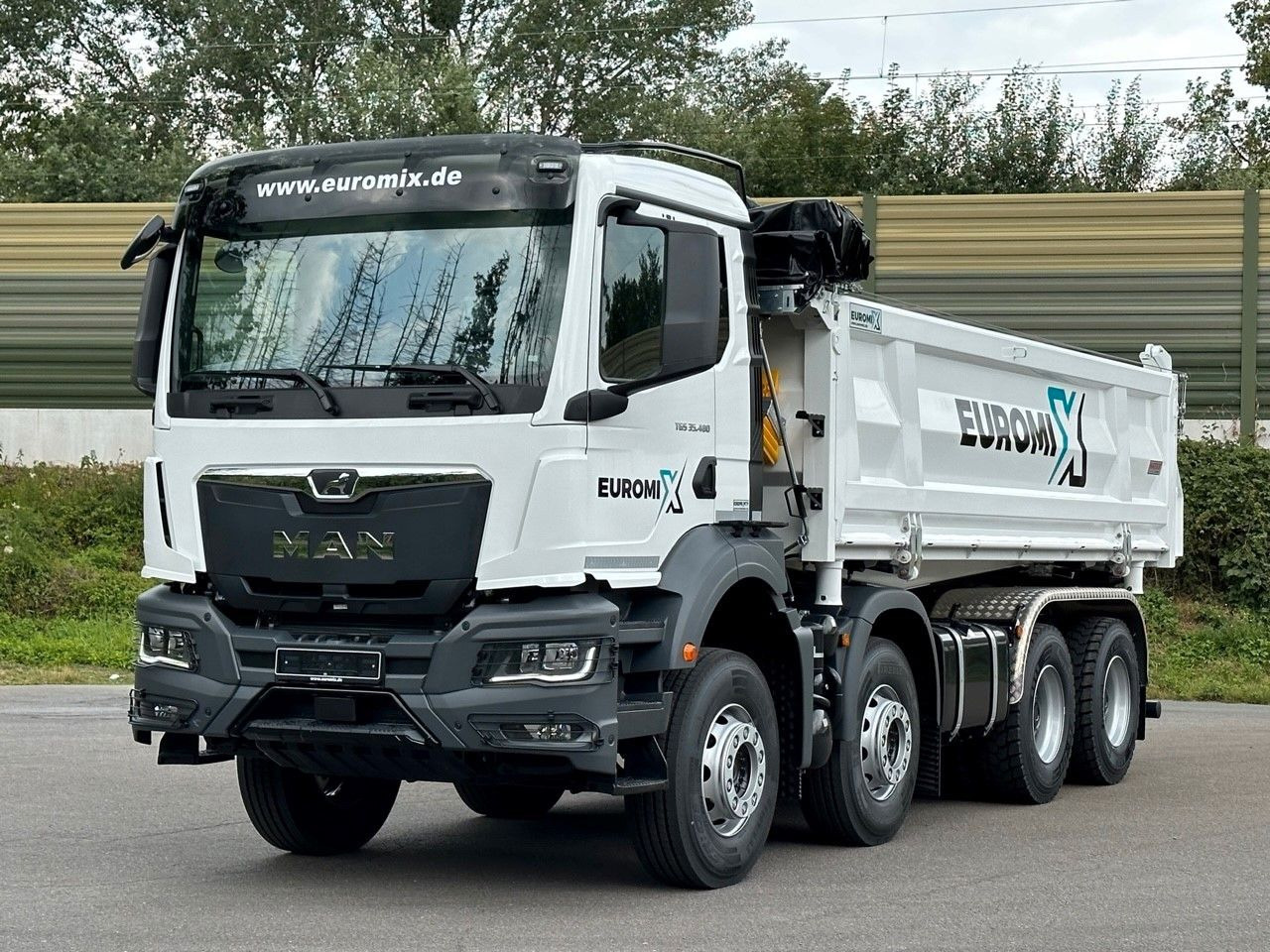 MAN TGS 35.480 8x4 EuromixMTP 3-Seiten-Kipper - Camion benne: photos 1 MAN TGS 35.480 8x4 EuromixMTP 3-Seiten-Kipper - Camion benne: photos 1