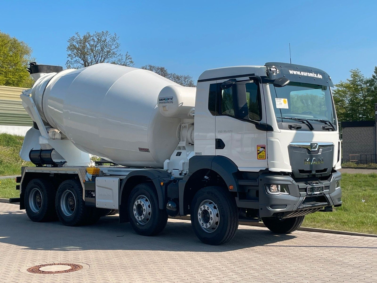 MAN TGS 35.520 8x4 /Euro6e EuromixMTP EM 10 L - Camion malaxeur: photos 1 MAN TGS 35.520 8x4 /Euro6e EuromixMTP EM 10 L - Camion malaxeur: photos 1