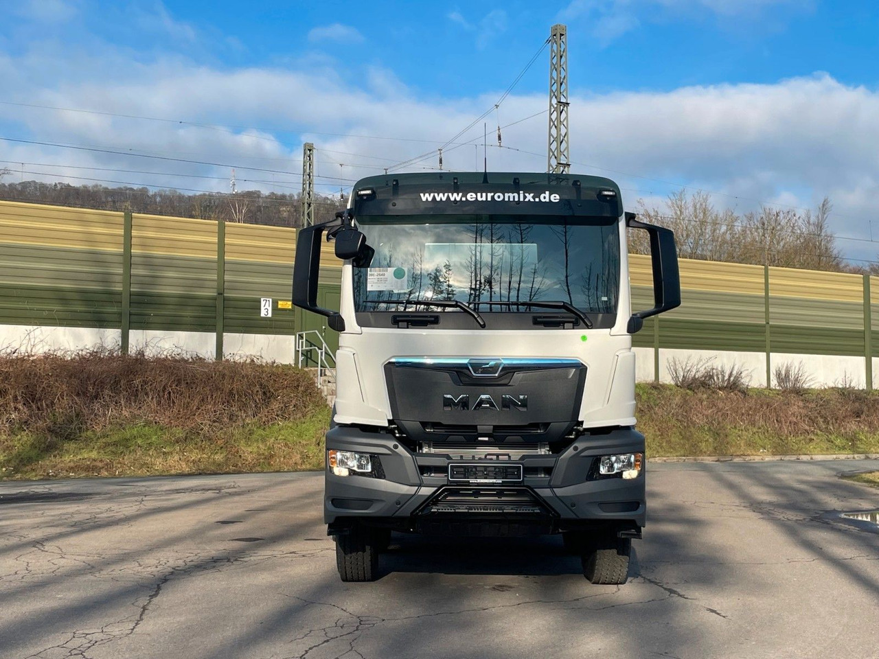 MAN TGS 41.400 8x4 / EuromixMTP EM 10m³ R / EURO 2 - Camion malaxeur: photos 2 MAN TGS 41.400 8x4 / EuromixMTP EM 10m³ R / EURO 2 - Camion malaxeur: photos 2