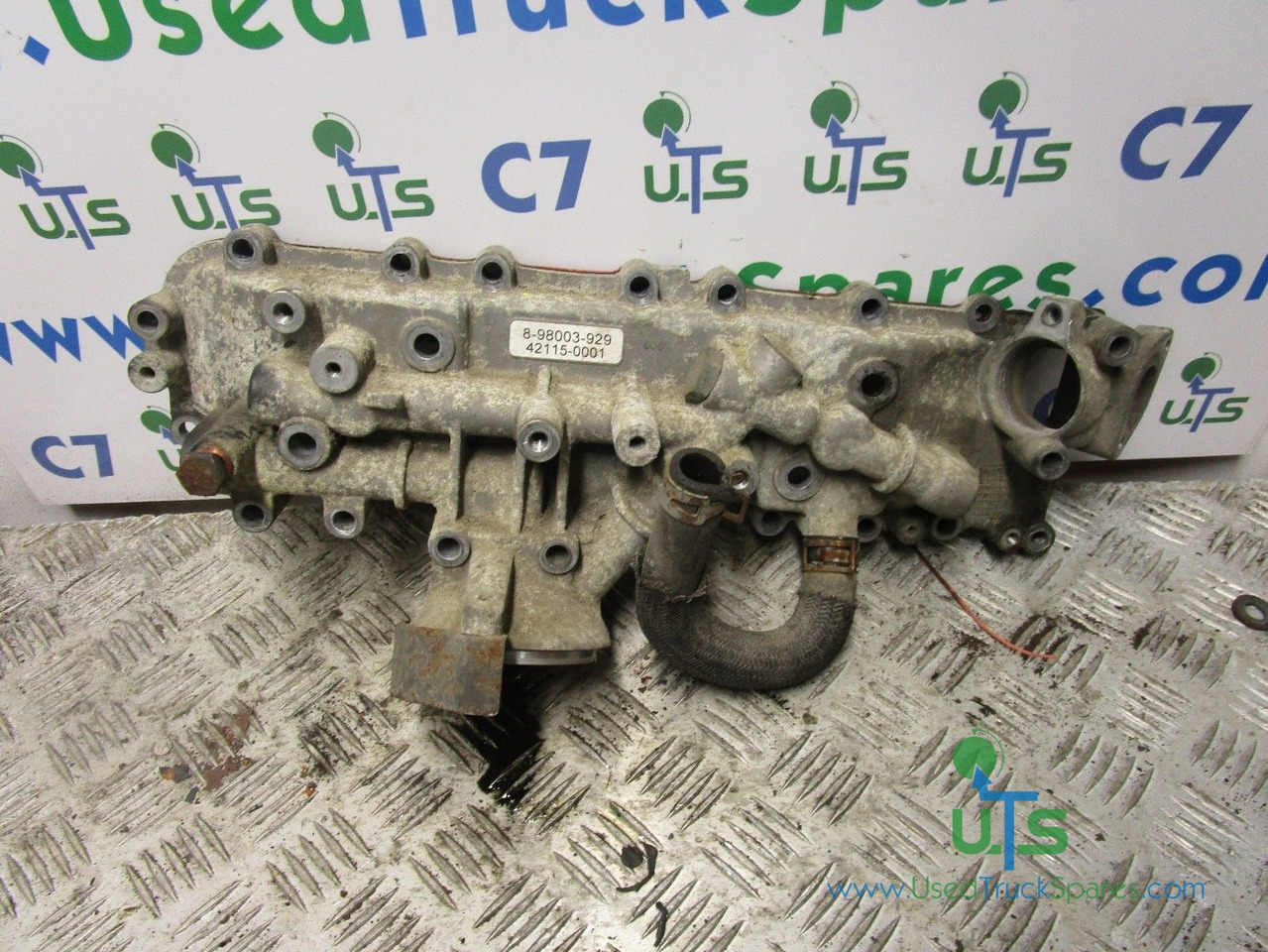 ISUZU NKR (4JJ1) OIL COOLER AND FILTER HOUSING P/NO 898003929 - Moteur et pièces pour Camion: photos 1 ISUZU NKR (4JJ1) OIL COOLER AND FILTER HOUSING P/NO 898003929 - Moteur et pièces pour Camion: photos 1