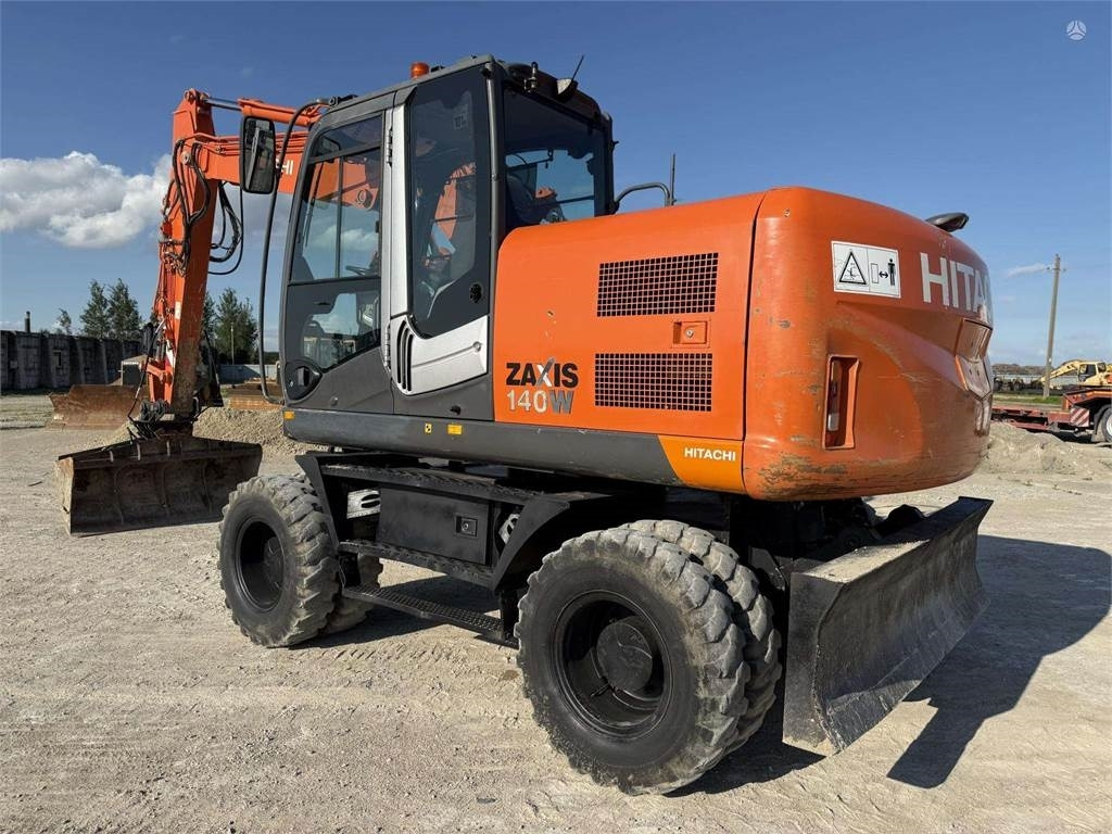 Hitachi ZX 140 W - Pelle sur pneus: photos 1 Hitachi ZX 140 W - Pelle sur pneus: photos 1