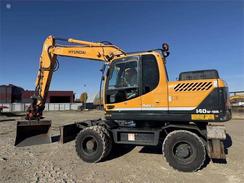 Hyundai Robex 140 W-9A Rototilt + grap  - Pelle sur pneus: photos 2 Hyundai Robex 140 W-9A Rototilt + grap  - Pelle sur pneus: photos 2