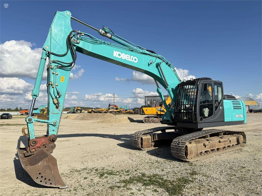 Kobelco SK 210 LC-10 from GERMANY - Pelle sur chenille: photos 1 Kobelco SK 210 LC-10 from GERMANY - Pelle sur chenille: photos 1