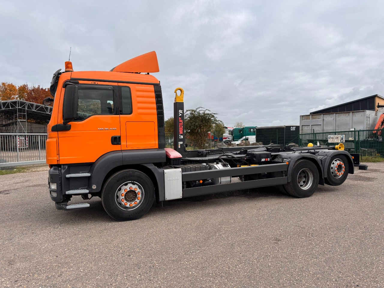 MAN 26.40 6X2 Multilift Abroller - Camion ampliroll: photos 1 MAN 26.40 6X2 Multilift Abroller - Camion ampliroll: photos 1