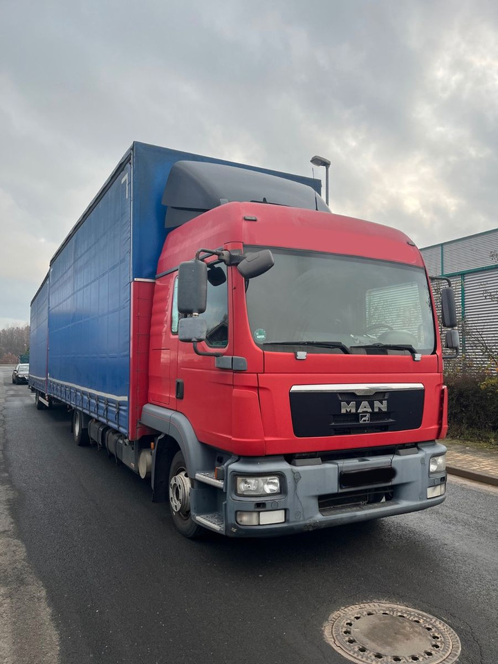 MAN 8.220 4X2 Pritschenwagen - Camion à rideaux coulissants: photos 2 MAN 8.220 4X2 Pritschenwagen - Camion à rideaux coulissants: photos 2