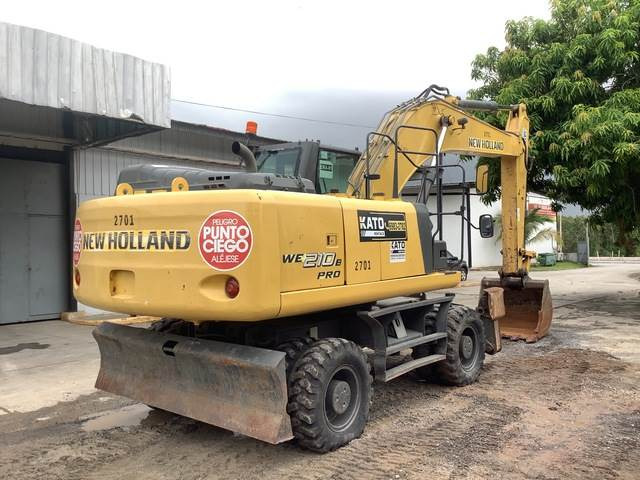 New Holland WE210 - Pelle sur pneus: photos 3 New Holland WE210 - Pelle sur pneus: photos 3