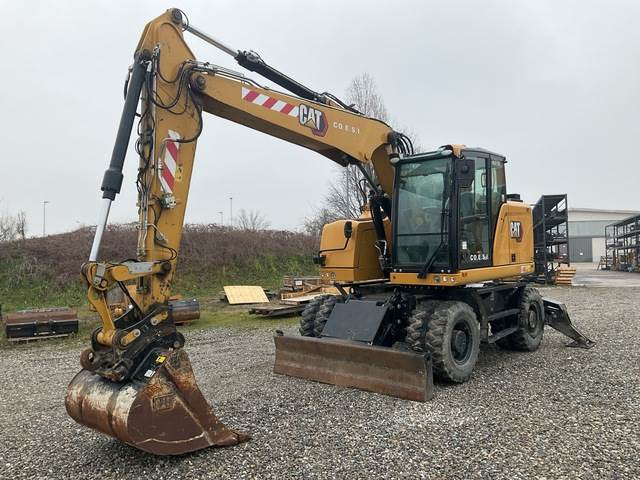 CAT M315F - Pelle sur pneus: photos 1 CAT M315F - Pelle sur pneus: photos 1