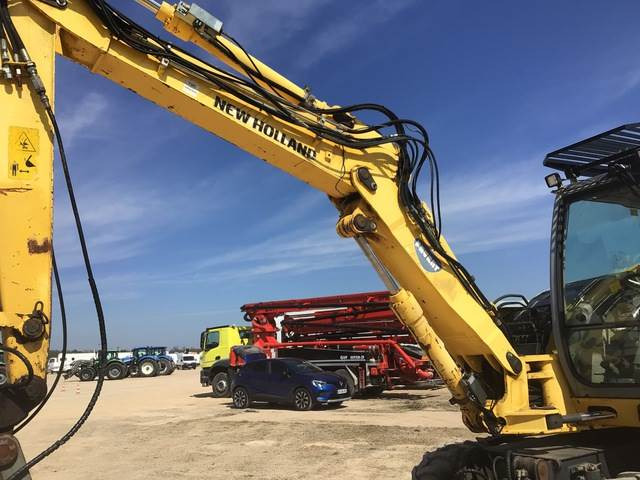 New Holland MH2.6 - Pelle sur pneus: photos 2 New Holland MH2.6 - Pelle sur pneus: photos 2
