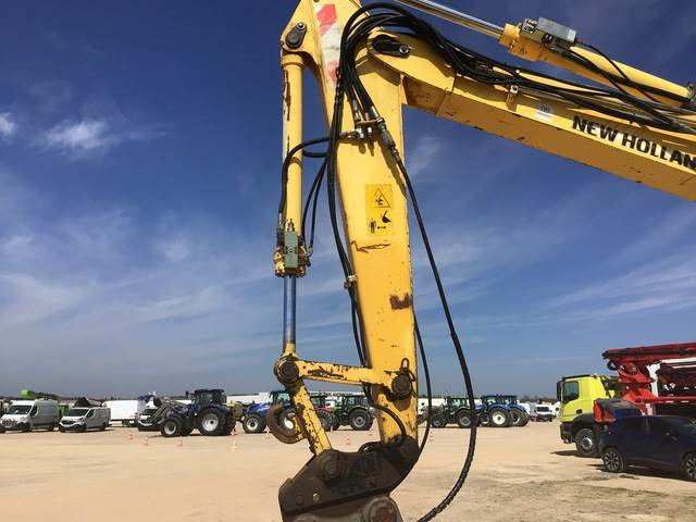 New Holland MH2.6 - Pelle sur pneus: photos 3 New Holland MH2.6 - Pelle sur pneus: photos 3