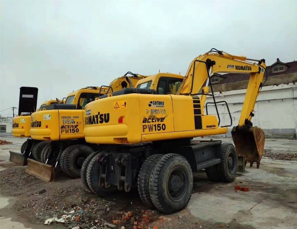 Komatsu PW150 - Pelle sur pneus: photos 1 Komatsu PW150 - Pelle sur pneus: photos 1