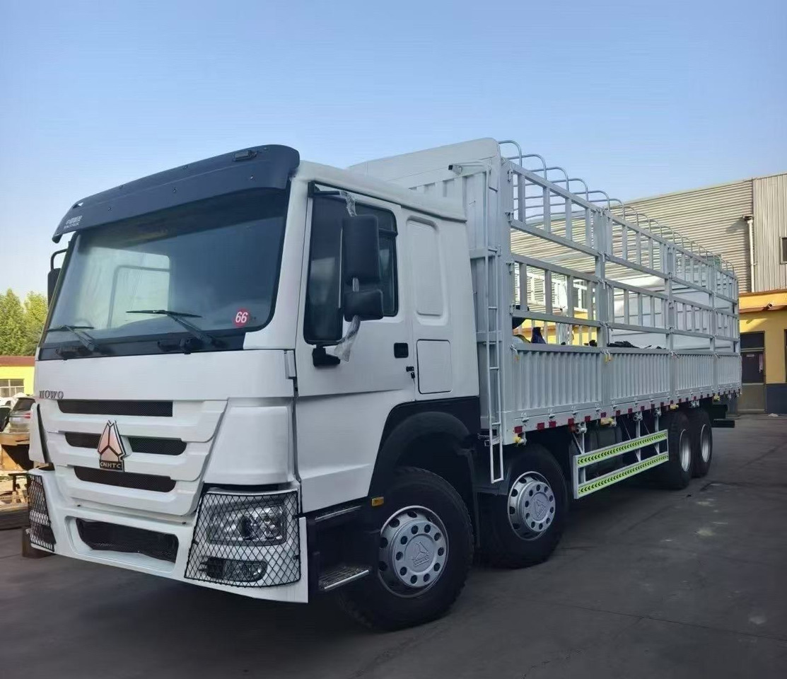 SINOTRUK HOWO DUMP TRUCK WITH FENCE 8*4 - Camion benne: photos 1 SINOTRUK HOWO DUMP TRUCK WITH FENCE 8*4 - Camion benne: photos 1