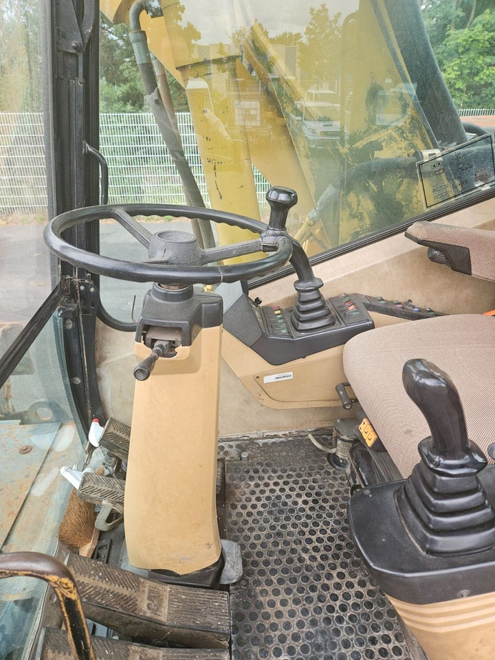 Pelle sur pneus CAT M315 Mobilbagger mit Pratzen und Schild: photos 11