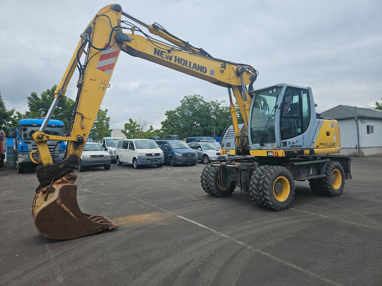 New Holland MH Plus 18t Mobilbagger - Pelle sur pneus: photos 1 New Holland MH Plus 18t Mobilbagger - Pelle sur pneus: photos 1