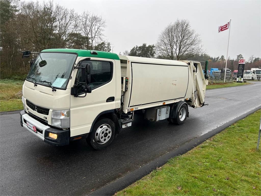 Mitsubishi Fuso CANTER 9C18 - Benne à ordures ménagères: photos 1 Mitsubishi Fuso CANTER 9C18 - Benne à ordures ménagères: photos 1