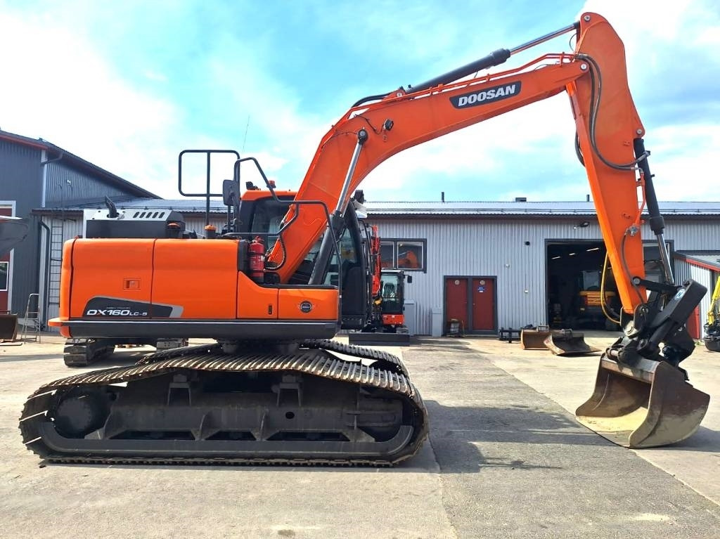 Doosan DX160LCH-5 METSÄMALLI KALLISTAJALLA - Pelle sur chenille: photos 5 Doosan DX160LCH-5 METSÄMALLI KALLISTAJALLA - Pelle sur chenille: photos 5