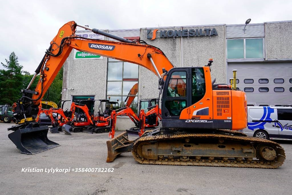 Doosan DX235LCR-5 3D NOVATRON EC-OIL - Pelle sur chenille: photos 1 Doosan DX235LCR-5 3D NOVATRON EC-OIL - Pelle sur chenille: photos 1