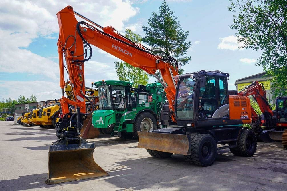 Hitachi ZX 140 W-6 - Pelle sur pneus: photos 2 Hitachi ZX 140 W-6 - Pelle sur pneus: photos 2