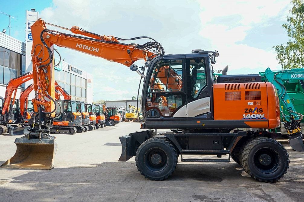 Hitachi ZX 140 W-6 - Pelle sur pneus: photos 1 Hitachi ZX 140 W-6 - Pelle sur pneus: photos 1