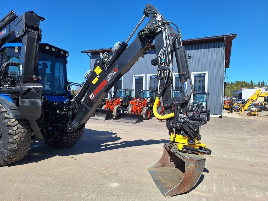Tractopelle Huddig 1260E CABLE, ISO NOSTIN YM.: photos 18