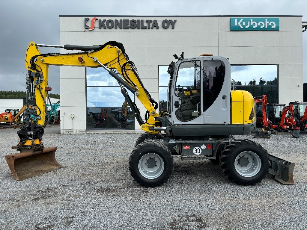 Wacker Neuson EW 100 - Pelle sur pneus: photos 1 Wacker Neuson EW 100 - Pelle sur pneus: photos 1