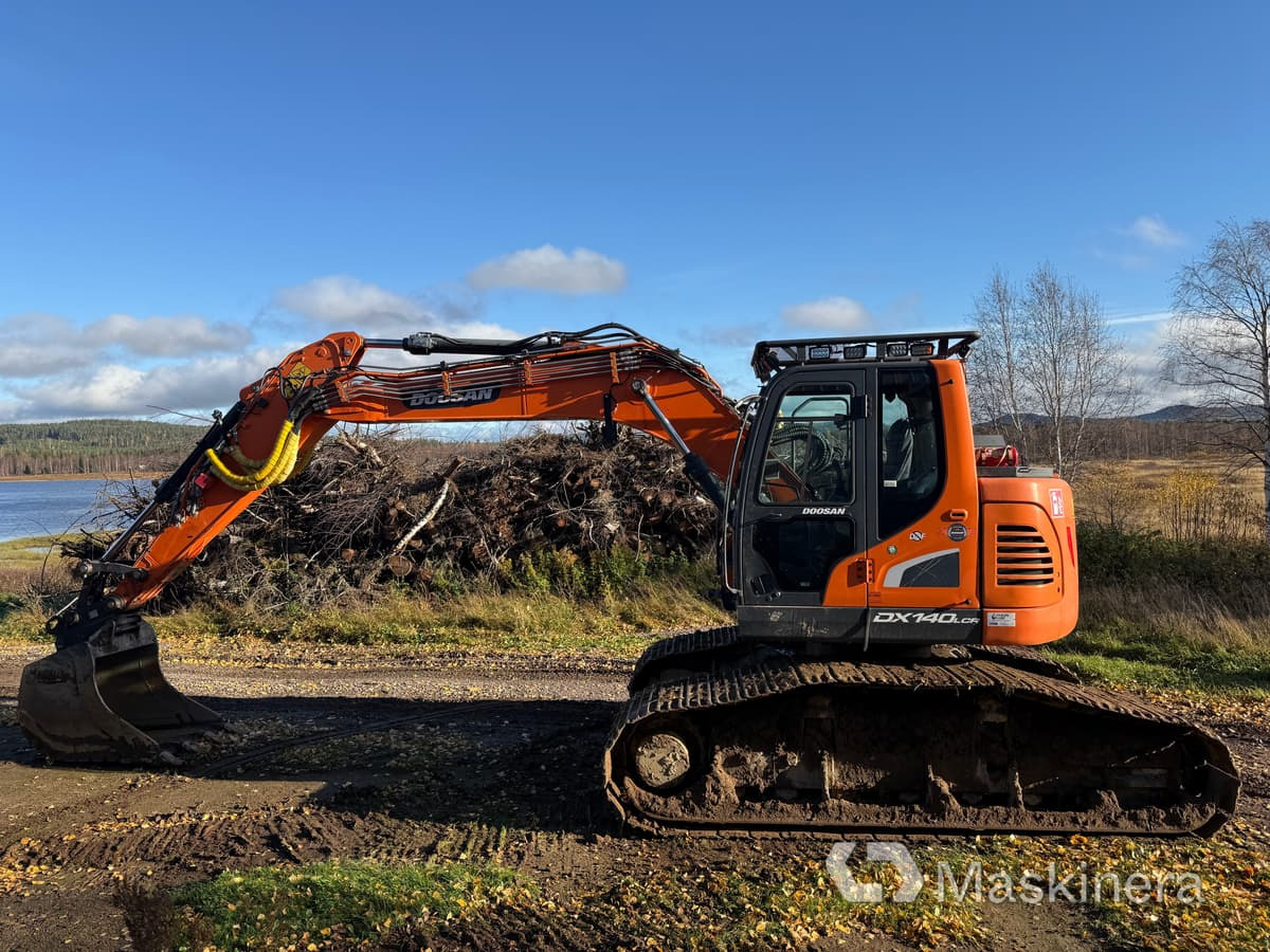 Grävmaskin Doosan DX140LCR-5 / Skördaraggregat 25RH - Pelle sur chenille: photos 2 Grävmaskin Doosan DX140LCR-5 / Skördaraggregat 25RH - Pelle sur chenille: photos 2