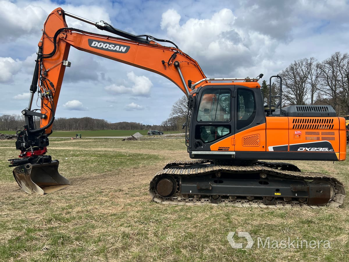 Grävmaskin Doosan DX235NLC-5 med grävsystem - Pelle sur chenille: photos 2 Grävmaskin Doosan DX235NLC-5 med grävsystem - Pelle sur chenille: photos 2