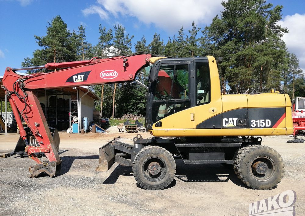 Caterpillar M315 C - Pelle sur pneus: photos 2 Caterpillar M315 C - Pelle sur pneus: photos 2