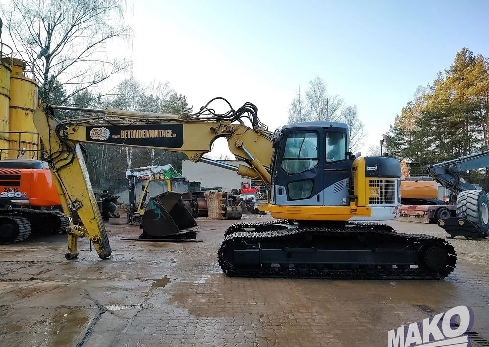 Komatsu PC228USLC-3 - Pelle sur chenille: photos 1 Komatsu PC228USLC-3 - Pelle sur chenille: photos 1