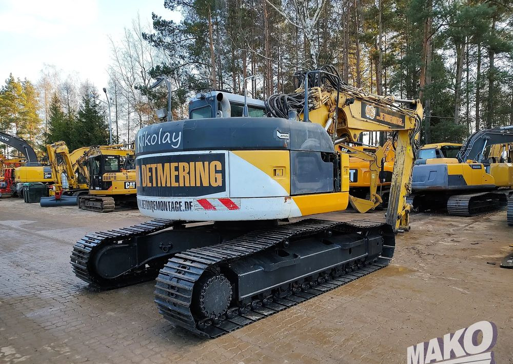 Komatsu PC228USLC-3 - Pelle sur chenille: photos 4 Komatsu PC228USLC-3 - Pelle sur chenille: photos 4