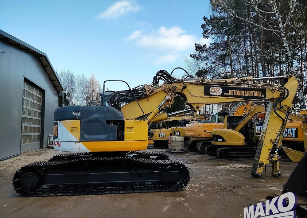 Komatsu PC228USLC-3 - Pelle sur chenille: photos 5 Komatsu PC228USLC-3 - Pelle sur chenille: photos 5