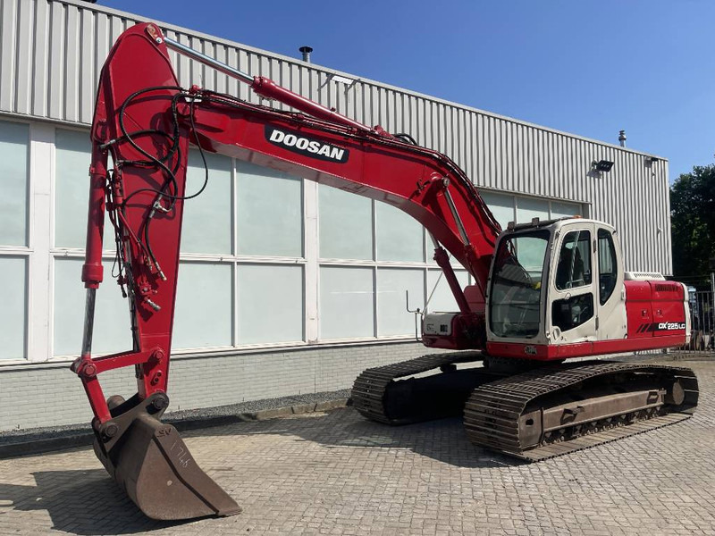 Doosan DX 225 LC - Pelle sur chenille: photos 1 Doosan DX 225 LC - Pelle sur chenille: photos 1