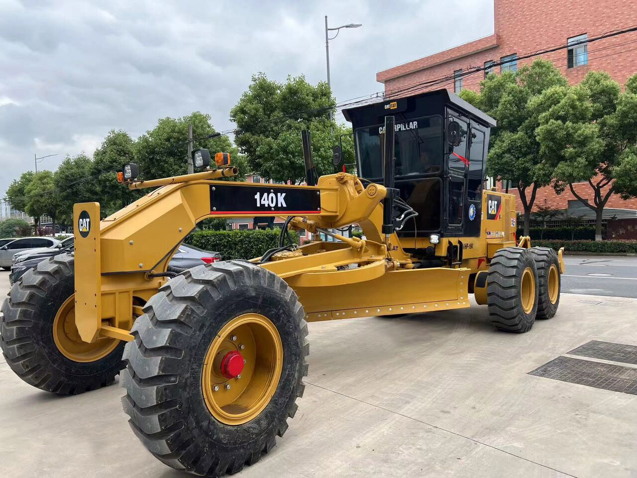 Caterpillar Motor Grader Secondhand CAT 140K, 140H with Good Price - Niveleuse: photos 1 Caterpillar Motor Grader Secondhand CAT 140K, 140H with Good Price - Niveleuse: photos 1