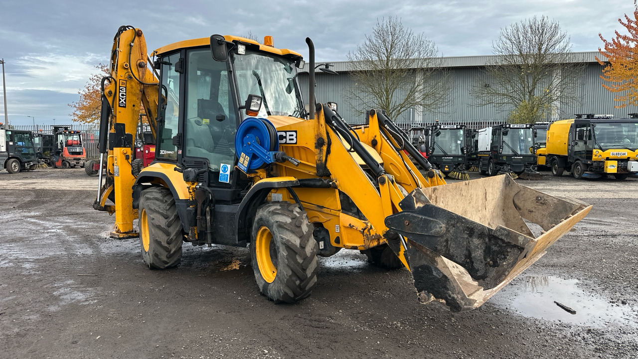 JCB 3CX Compact 12L4WS - Tractopelle: photos 1 JCB 3CX Compact 12L4WS - Tractopelle: photos 1