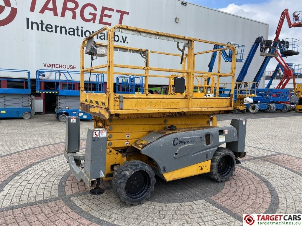 Haulotte Compact 12DX Diesel 4x4 Scissor Work Lift 1206cm - Nacelle ciseaux: photos 1 Haulotte Compact 12DX Diesel 4x4 Scissor Work Lift 1206cm - Nacelle ciseaux: photos 1