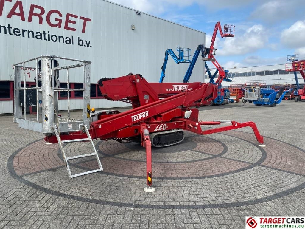 Teupen Leo 23GT Tracked Bi-Fuel Boom Work Lift 2300cm - Nacelle télescopique: photos 1 Teupen Leo 23GT Tracked Bi-Fuel Boom Work Lift 2300cm - Nacelle télescopique: photos 1