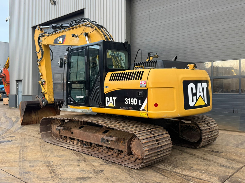 Caterpillar 319DL - Pelle sur chenille: photos 3 Caterpillar 319DL - Pelle sur chenille: photos 3