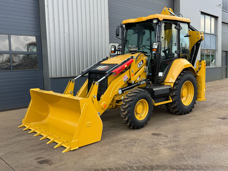 Caterpillar 424 - 4x4 / 4WD / AC - Tractopelle: photos 2 Caterpillar 424 - 4x4 / 4WD / AC - Tractopelle: photos 2