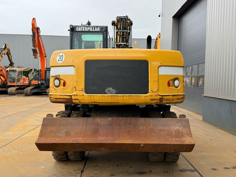 Caterpillar M315D - Pelle sur pneus: photos 4 Caterpillar M315D - Pelle sur pneus: photos 4