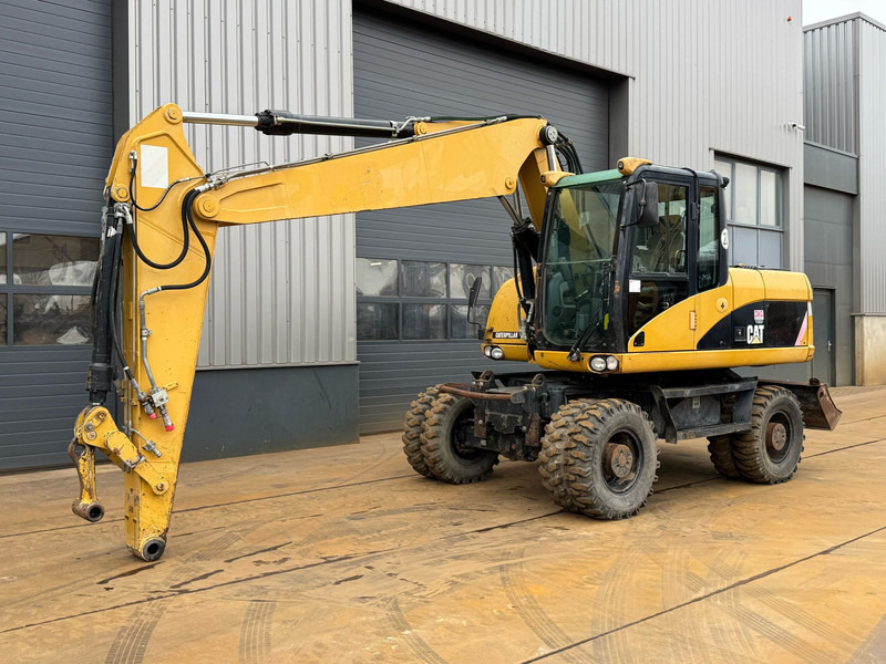 Caterpillar M315D - Pelle sur pneus: photos 2 Caterpillar M315D - Pelle sur pneus: photos 2