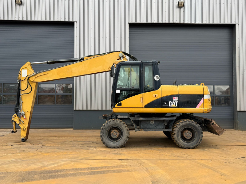 Caterpillar M315D - Pelle sur pneus: photos 1 Caterpillar M315D - Pelle sur pneus: photos 1